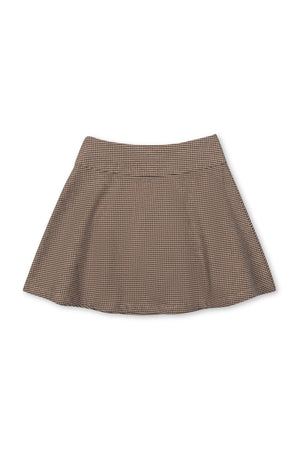 A twirly circle skirt in a camel houndstooth pattern, featuring a wide waistband and soft organic cotton material.