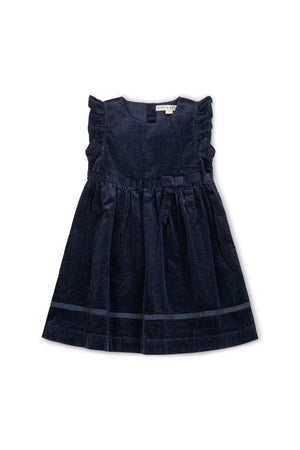 Navy organic cotton jumper dress featuring flutter sleeves, a bow detail, and crochet trim, perfect for toddlers and kids.