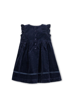 Navy organic cotton jumper dress featuring flutter sleeves, a bow detail, and a button-back closure. Ideal for toddlers and kids.