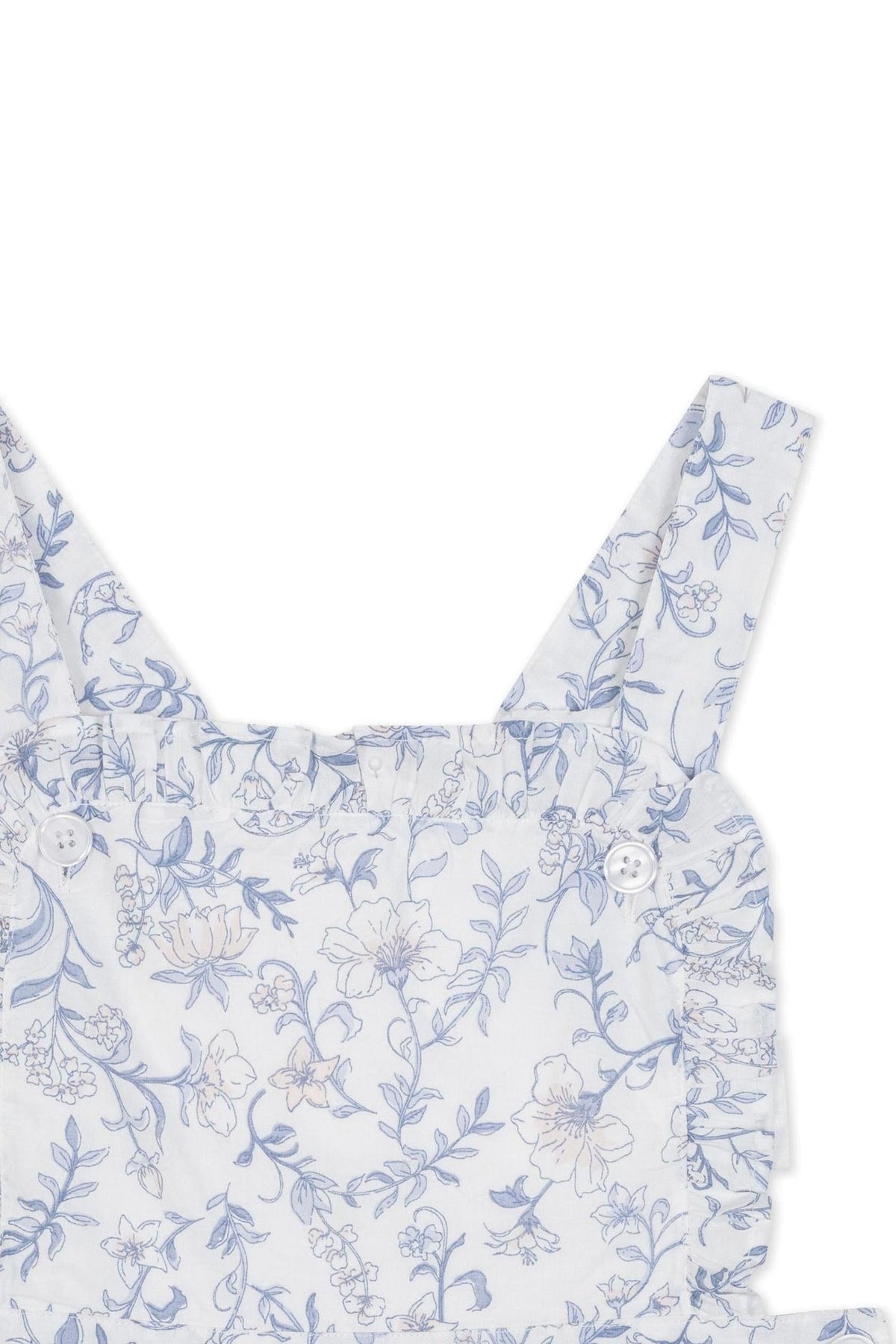 Close-up of a blue floral pattern on an organic cotton apron dress featuring delicate ruffles and adjustable straps, designed for toddlers and kids by Hope & Henry.