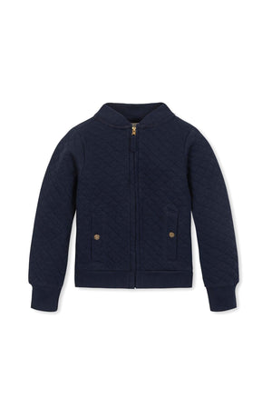 Navy blue organic cotton quilted bomber jacket featuring a zip front, ribbed trim, and gold-buttoned front pockets.