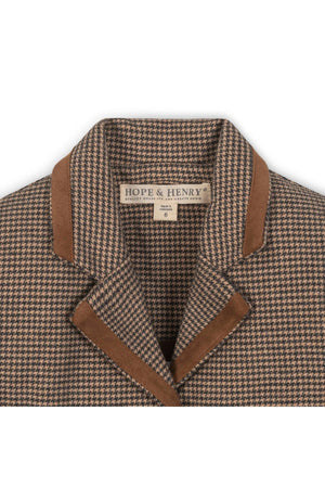 Close-up of a brown houndstooth blazer collar with faux suede taping, featuring the Hope & Henry brand label.