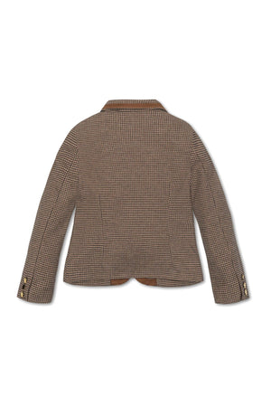 Back view of a stylish girls blazer in a brown houndstooth pattern, featuring a notch collar and gold buttons.