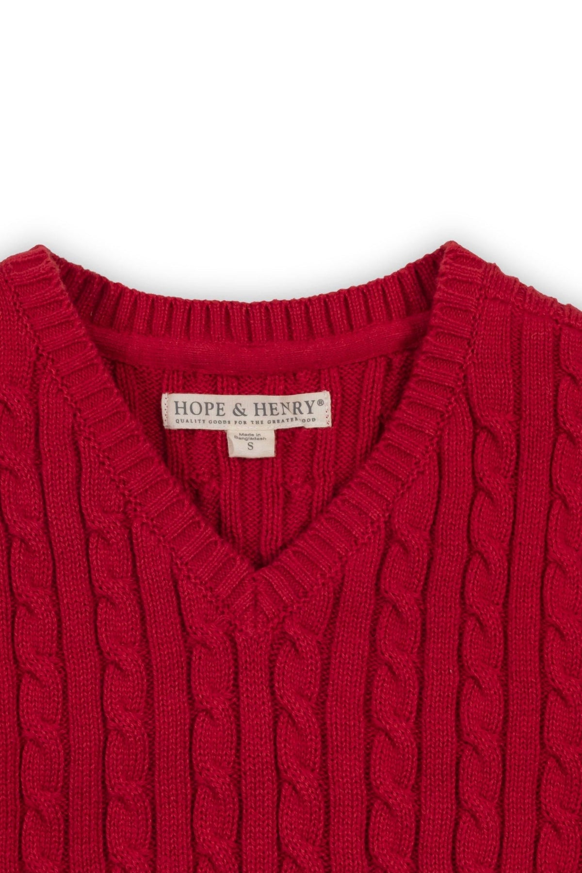 A close-up of a vibrant red cable-knit sweater vest by Hope & Henry, showcasing a classic v-neck design.