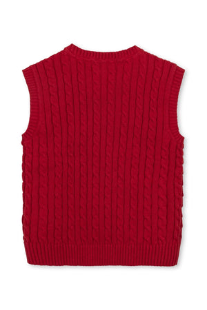 Red organic cotton cable knit sweater vest with a classic v-neck design, featuring textured ribbing and sleeveless styling.