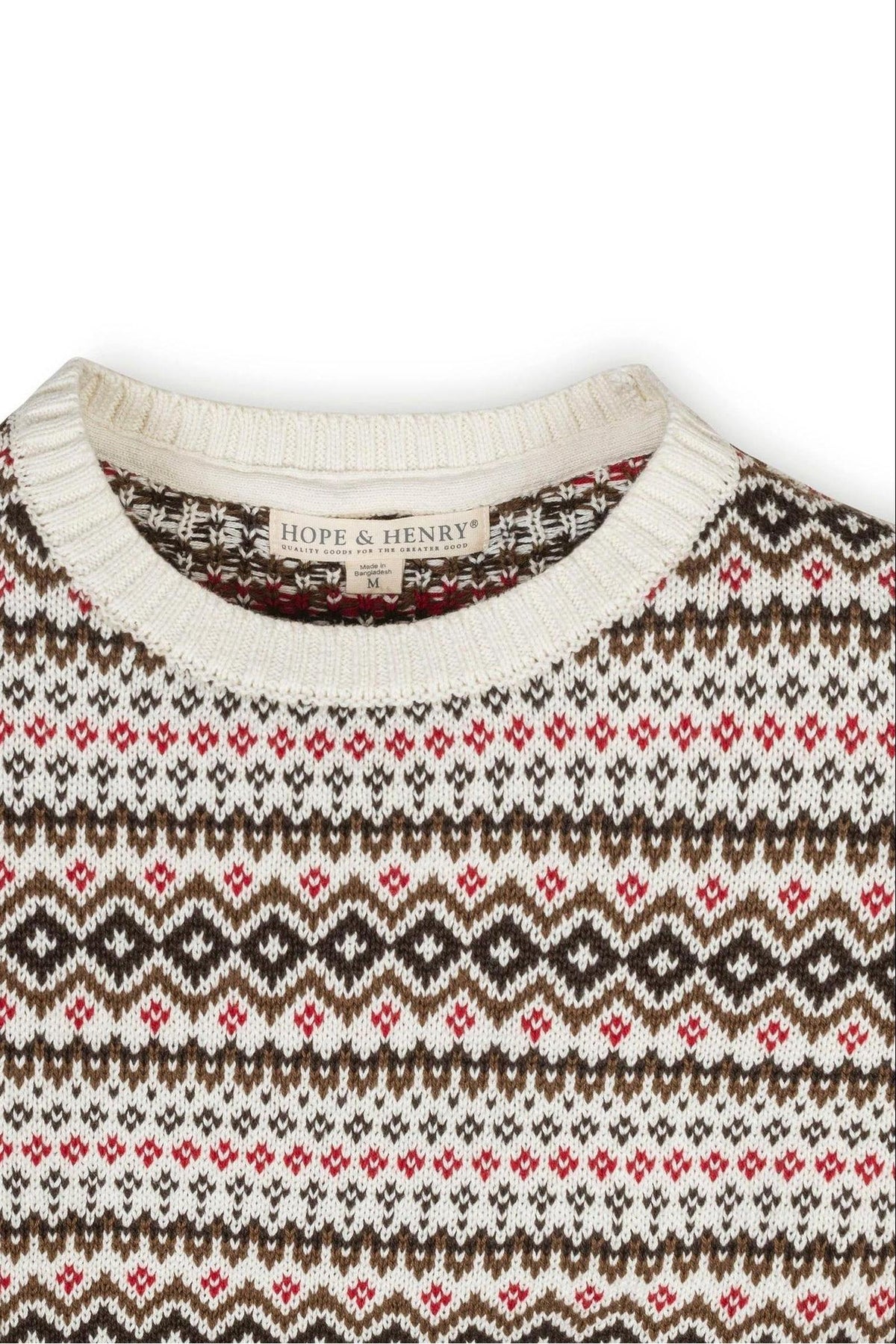 Close-up of a Hope & Henry crew neck sweater featuring a Fair Isle pattern in ivory, brown, and red hues. Made from soft organic cotton, it’s designed for sustainable comfort.