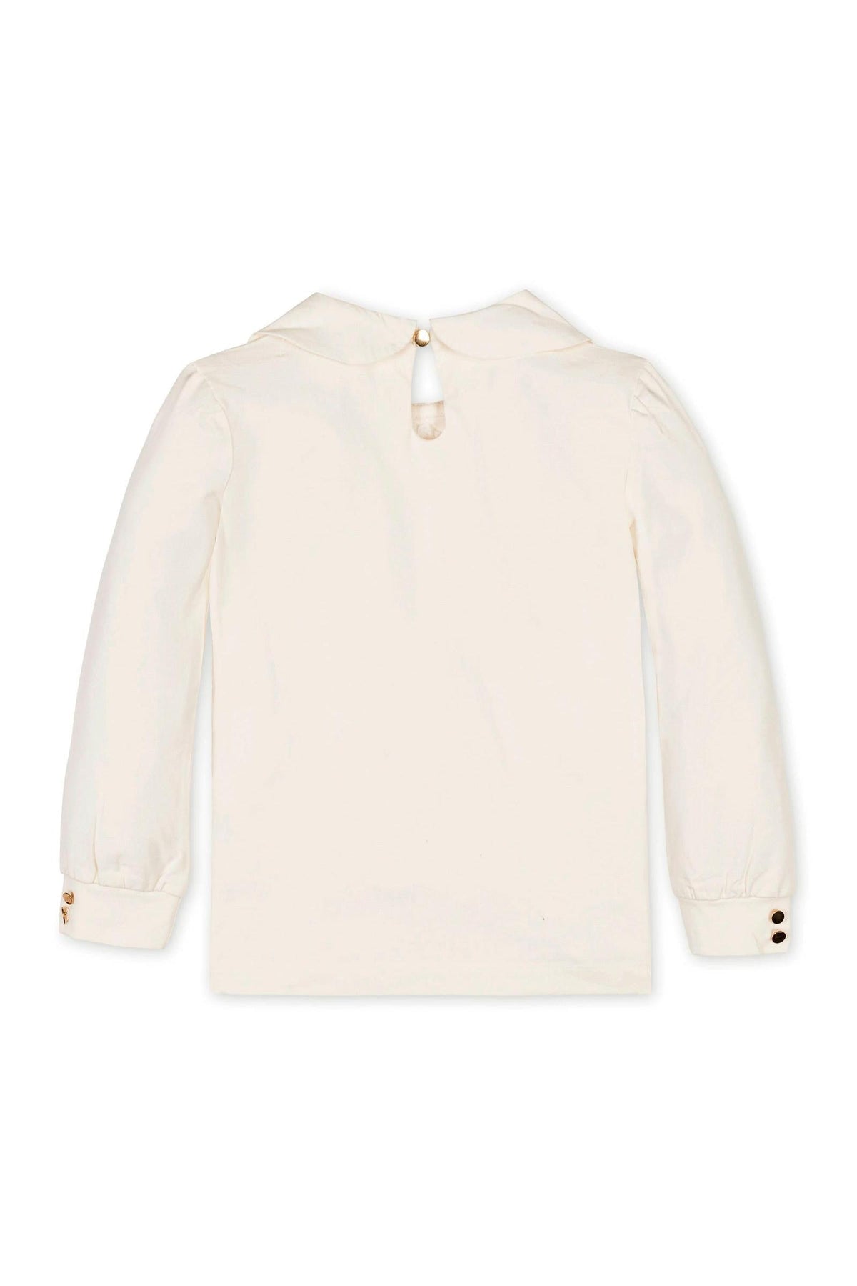 Back view of an ivory long-sleeve knit top featuring a Peter Pan collar and a keyhole neck closure.