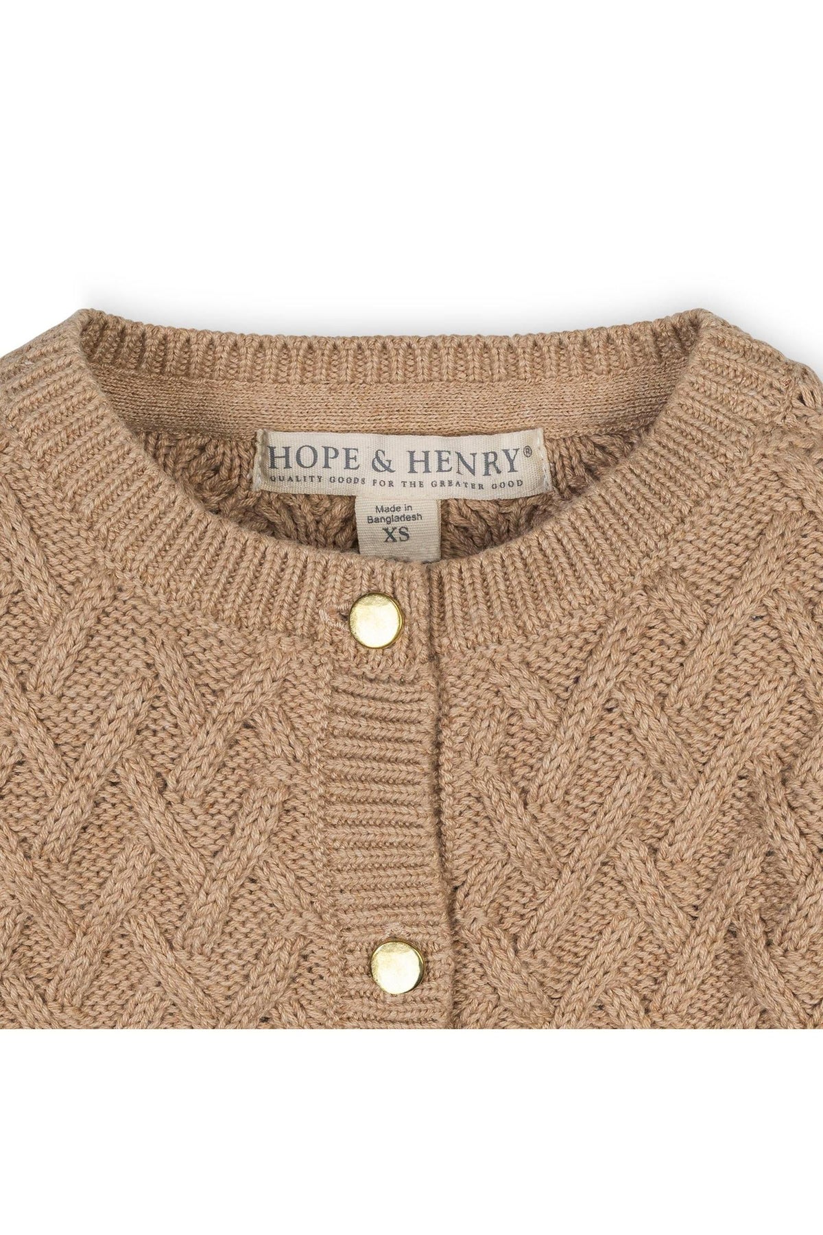 Close-up of a camel-colored organic cotton cardigan by Hope & Henry, featuring a herringbone cable knit pattern and gold shank buttons.