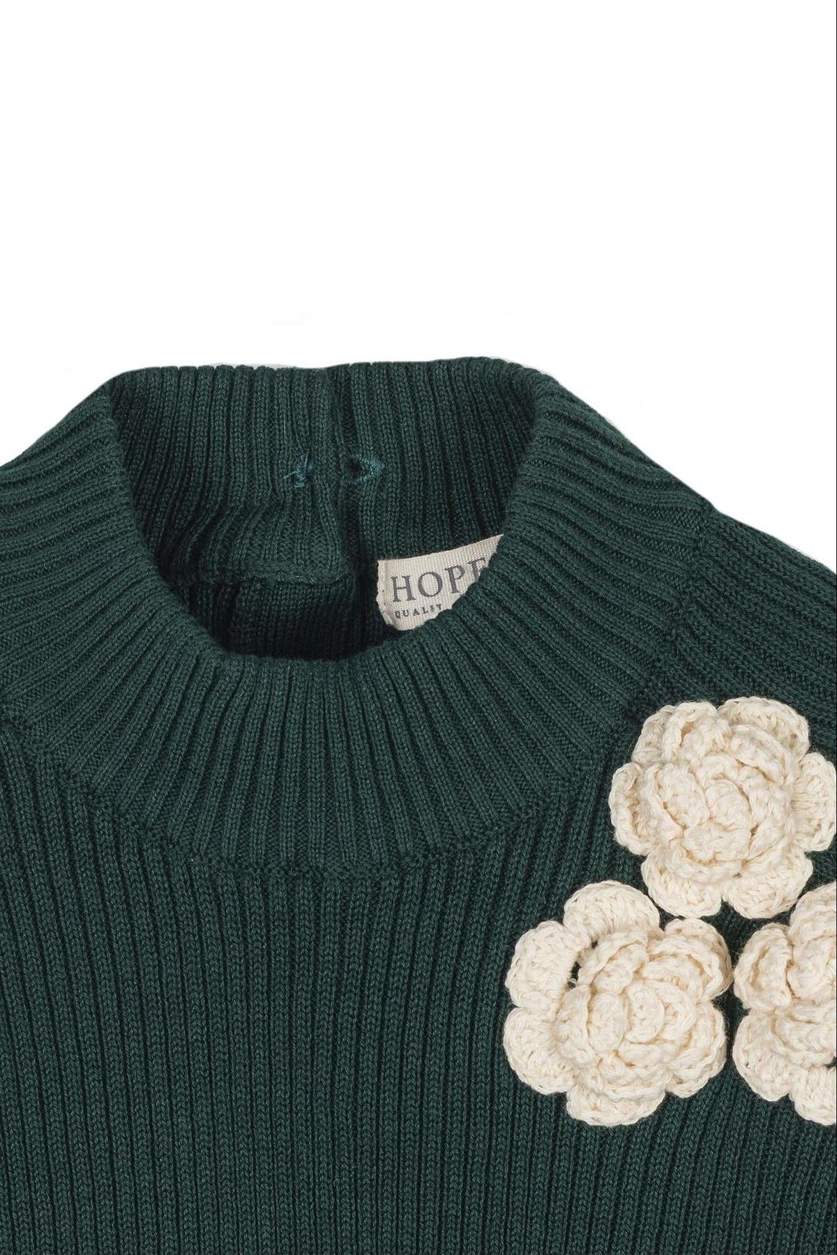 Dark green organic cotton sweater featuring a mock neck and decorative cream-colored rosettes, ideal for toddlers and kids.