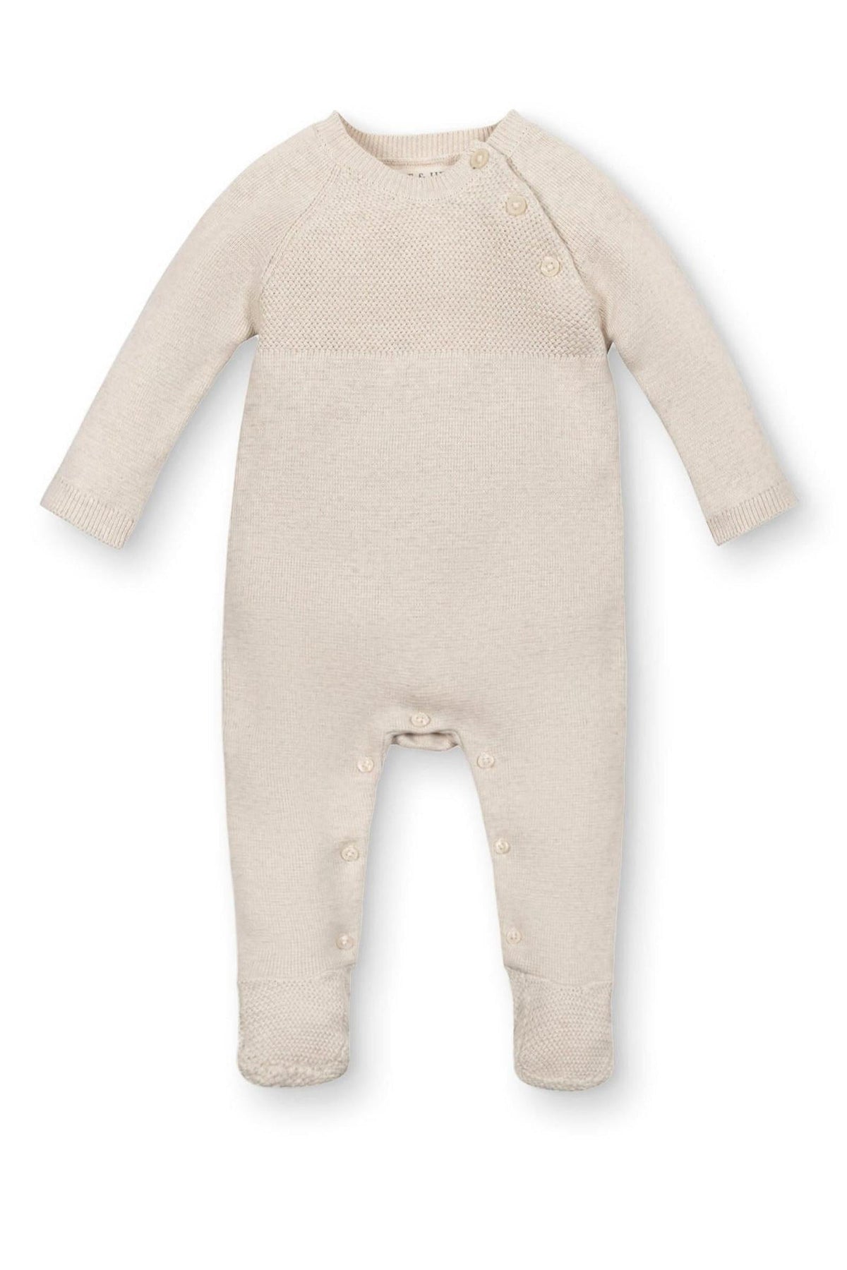 Light oatmeal footed romper made from soft organic cotton, featuring raglan sleeves and button closures for easy dressing.