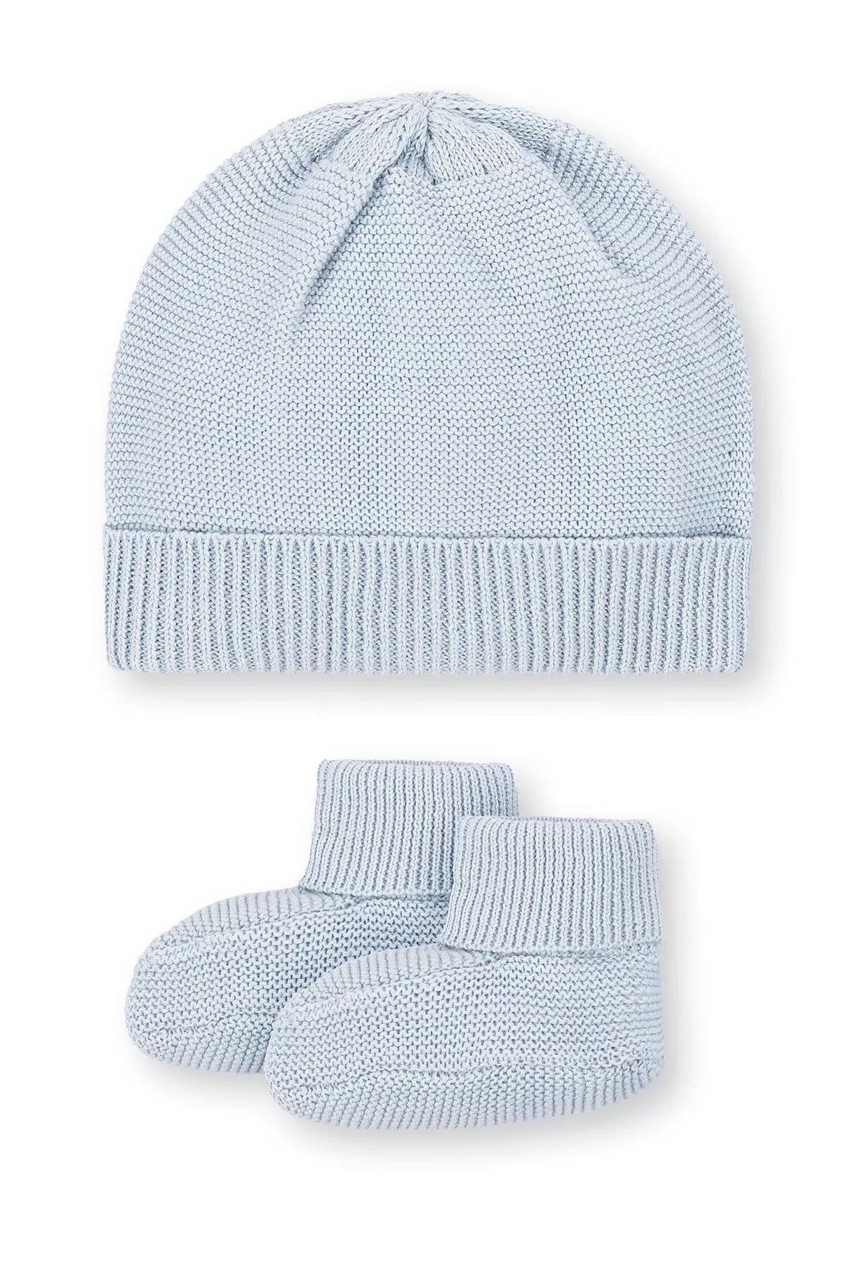 Pale blue organic cotton beanie and bootie set displayed together, featuring a soft knit texture and ribbed trim.