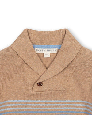 Close-up view of a camel-colored shawl collar sweater by Hope & Henry, featuring a button closure and light blue stripe details.