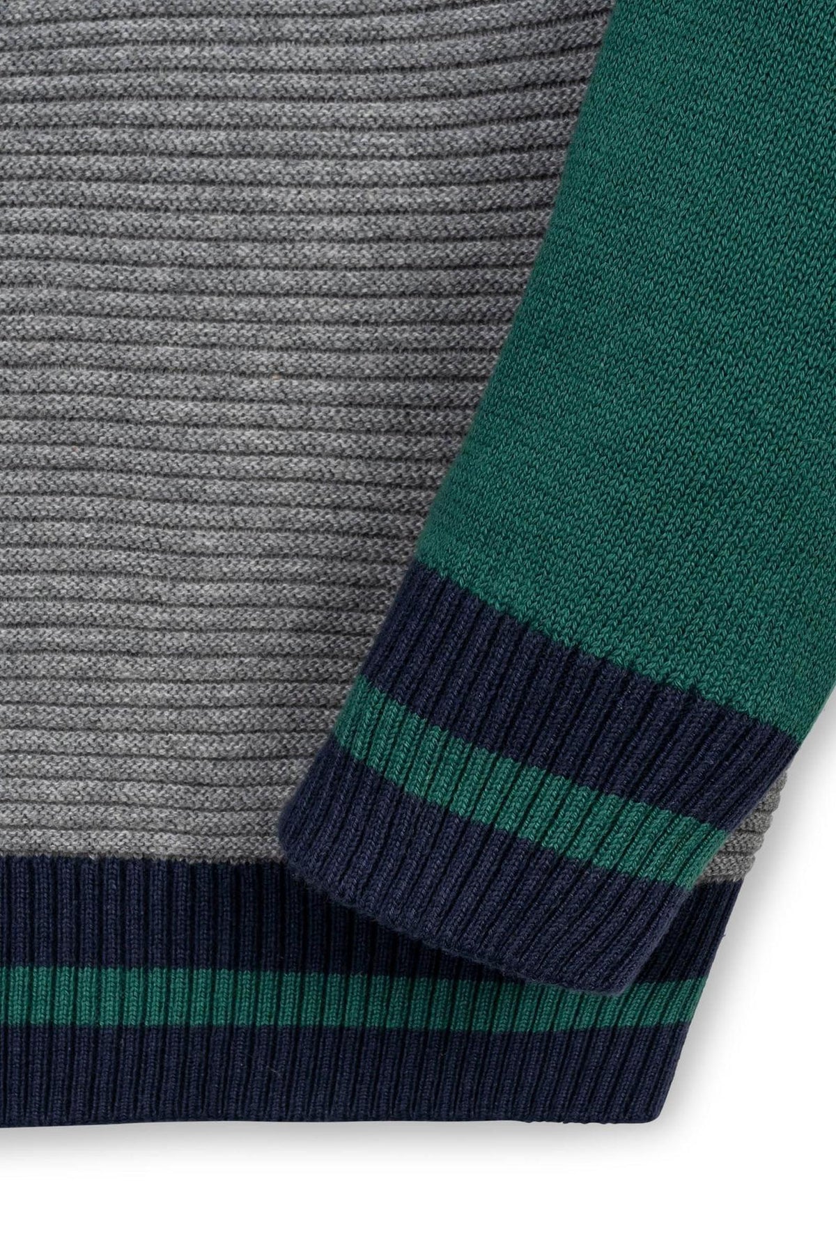 Close-up of a gray and green organic cotton raglan sweater, featuring textured ribbing and contrasting navy stripes at the cuffs, showcasing a sporty and polished design suitable for boys.