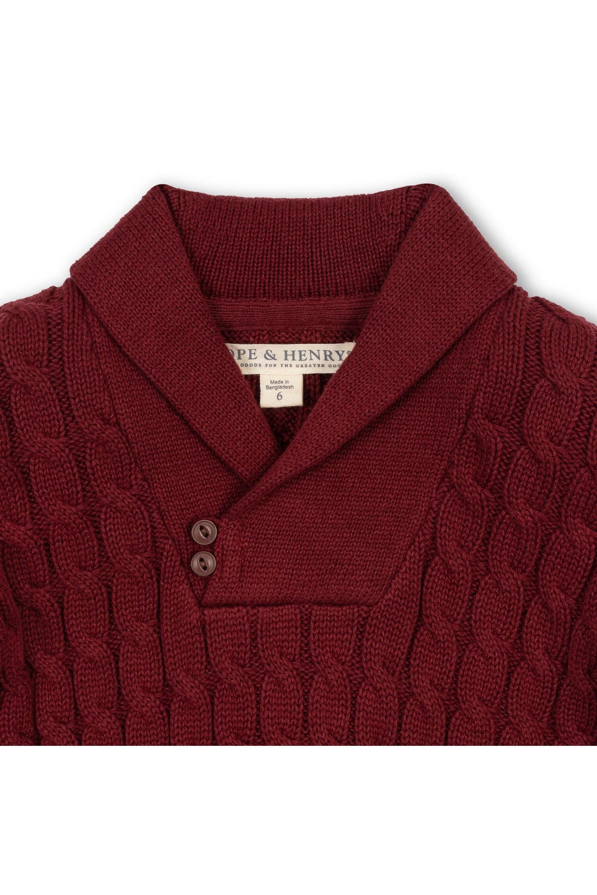 Close-up of a cozy oxblood shawl collar cable sweater made from soft organic cotton, featuring a button closure and a textured knit design. Ideal for boys aged 2T-18.
