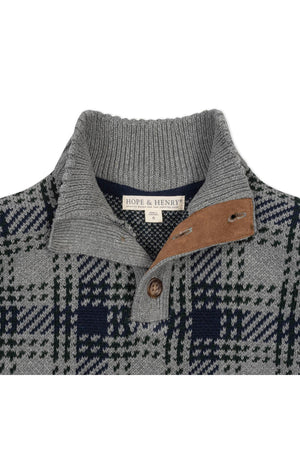 Gray mock neck sweater by Hope & Henry features a distinctive check pattern with navy accents and a tan suede patch.