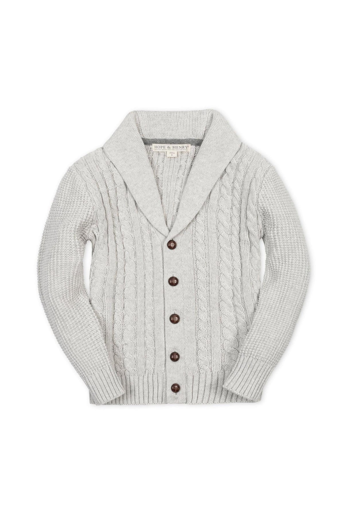 Light gray organic cotton shawl collar cardigan featuring a textured cable knit design and wooden buttons, suitable for boys sizes 2T to 18/20. Perfect for stylish, sustainable everyday wear.