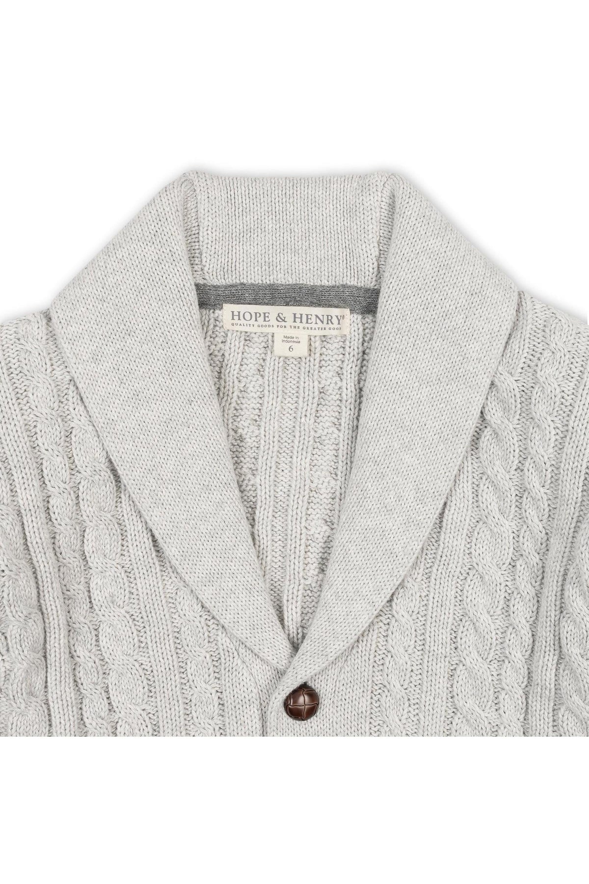 A light gray shawl collar cardigan from Hope & Henry features a textured cable knit design with a single button closure.