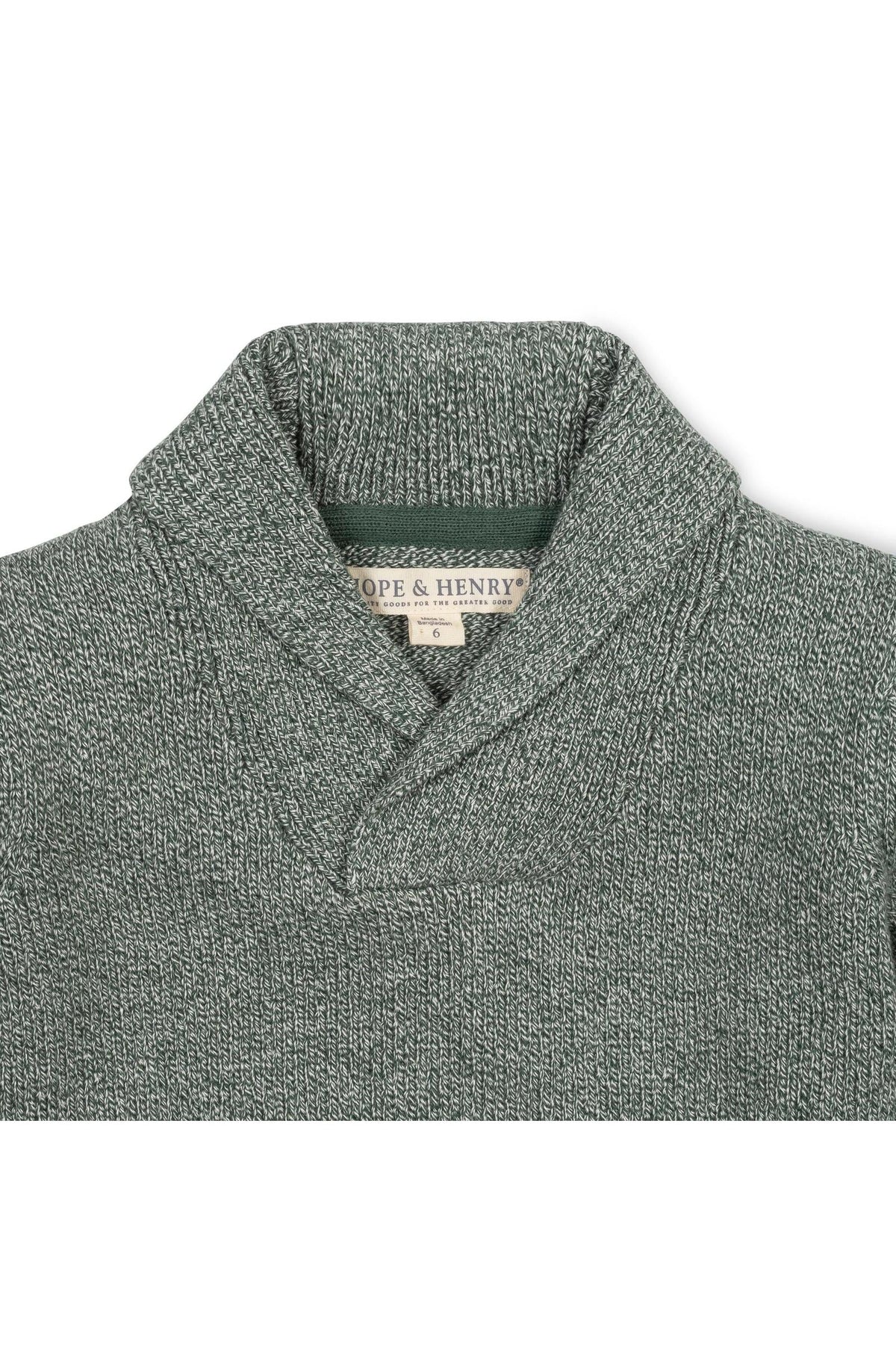 A close-up of a green shawl collar sweater made from organic cotton, featuring a textured knit and the brand label Hope & Henry visible inside the collar.