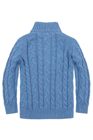 Back view of a medium blue organic cotton mock neck sweater featuring a textured cable knit design. The sweater is designed for children and showcases a cozy, stylish look.