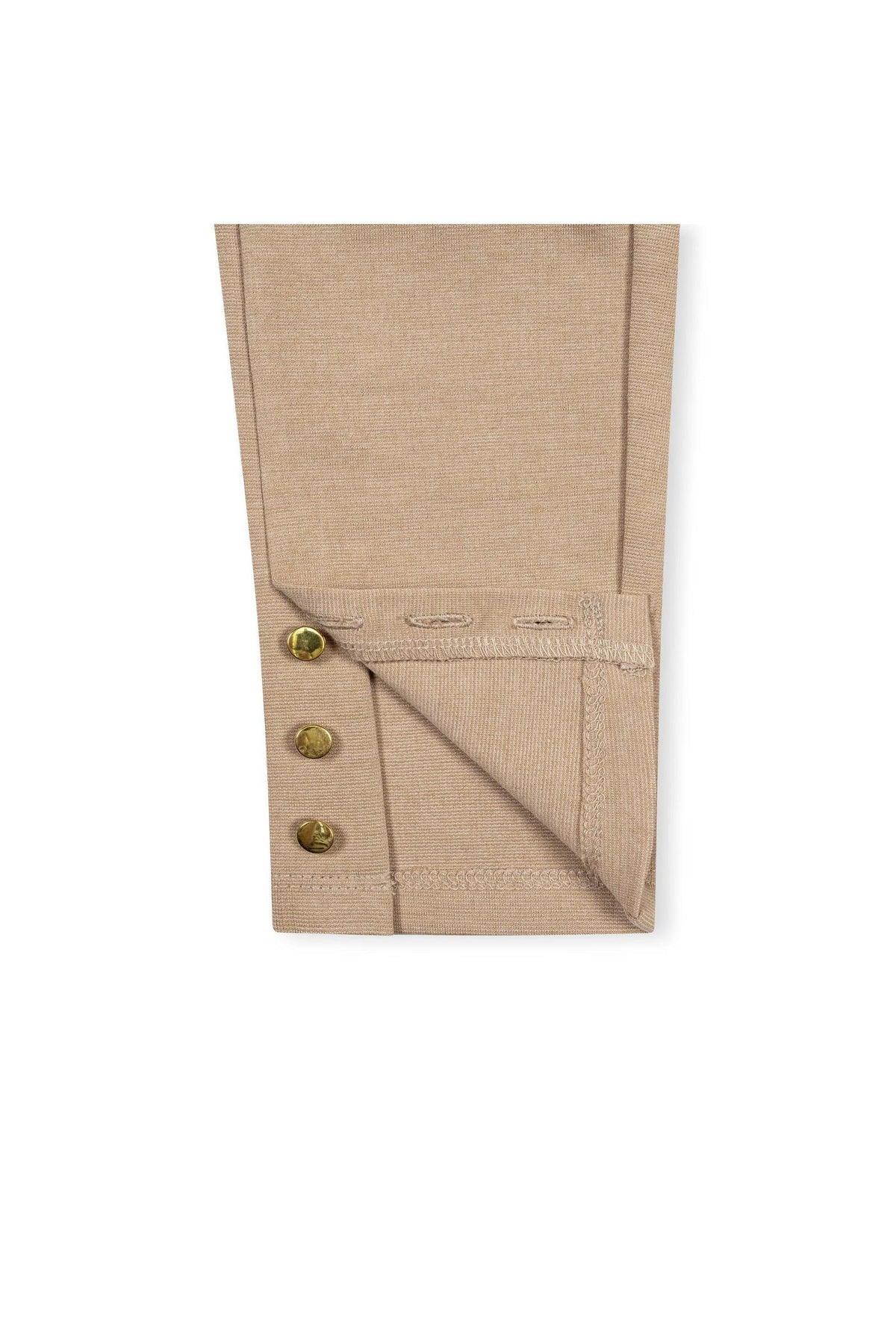 Close-up of the camel-colored cuff of an Organic Cotton Button Cuff Ponte Pant, featuring three decorative buttons and a soft, textured fabric ideal for toddlers and girls.