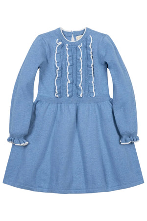 A medium blue organic cotton sweater dress features a ruffled bodice and cuffs, with a full skirt and keyhole closure at the back. Perfect for toddlers and kids.