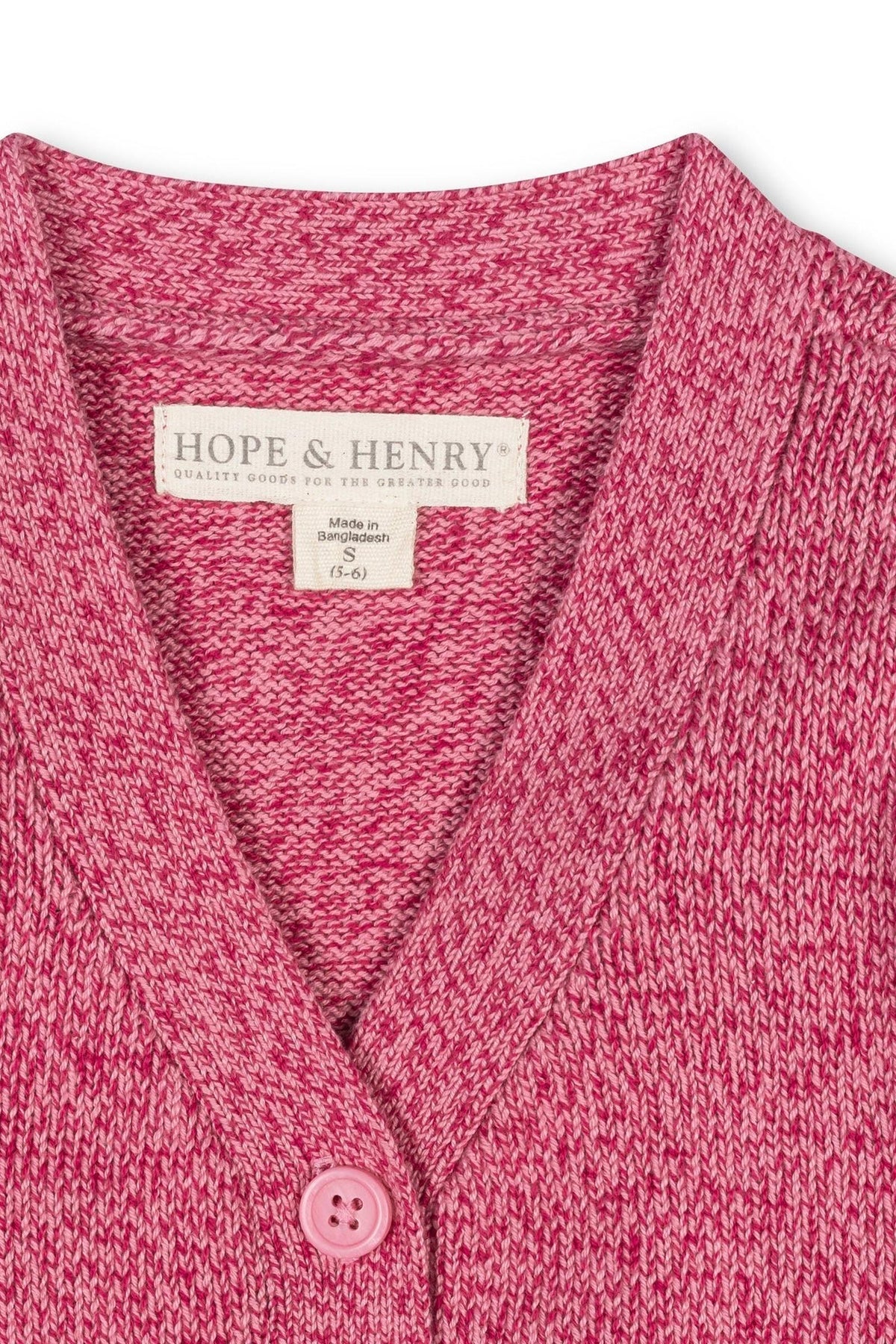 A close-up of a vibrant pink V-neck cardigan made from organic cotton, featuring a textured knit and a single button closure. The label reads Hope & Henry, indicating quality craftsmanship.