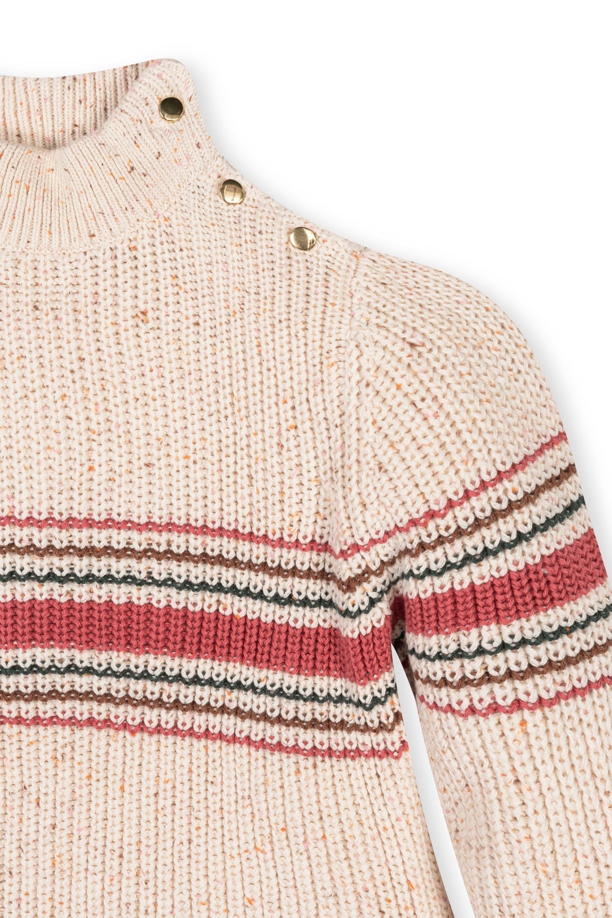 An ivory mock neck sweater features a textured knit with colorful stripes in red, black, and cream. The stylish design includes decorative buttons on the shoulder, perfect for kids.