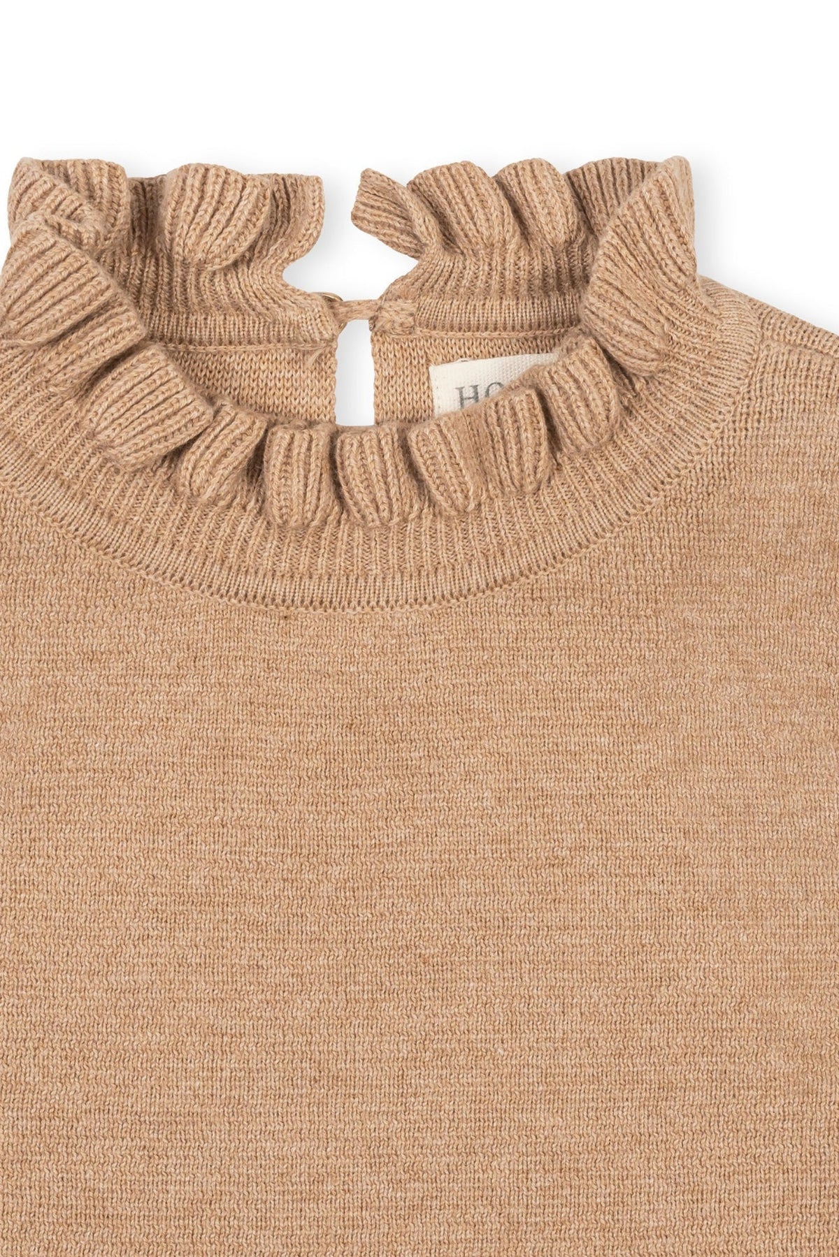 Close-up of a camel-colored organic cotton sweater dress featuring a ruffled mock neck and a keyhole back. The soft fabric is perfect for toddlers and kids, combining comfort and style.