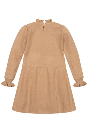 A back view of a camel-colored organic cotton sweater dress featuring long sleeves with ruffle cuffs and a ruffled mock neck, designed for toddlers and kids.
