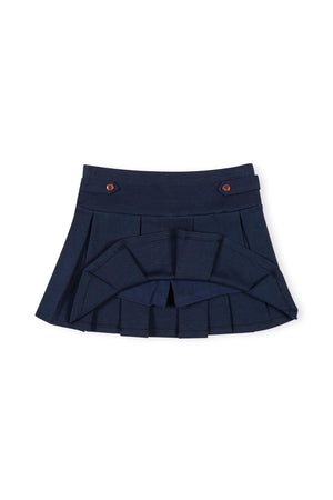 Navy classic ponte pleated skort featuring button tab details, designed for toddlers and girls. The soft jersey inner short offers comfort and coverage for active play and school settings.