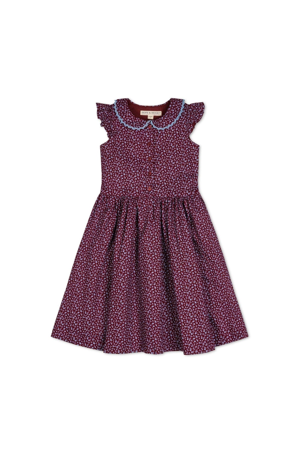 A wine-colored linen dress featuring a Peter Pan collar, delicate crochet trim, and flutter sleeves. The dress is adorned with a floral print, perfect for toddlers and girls.