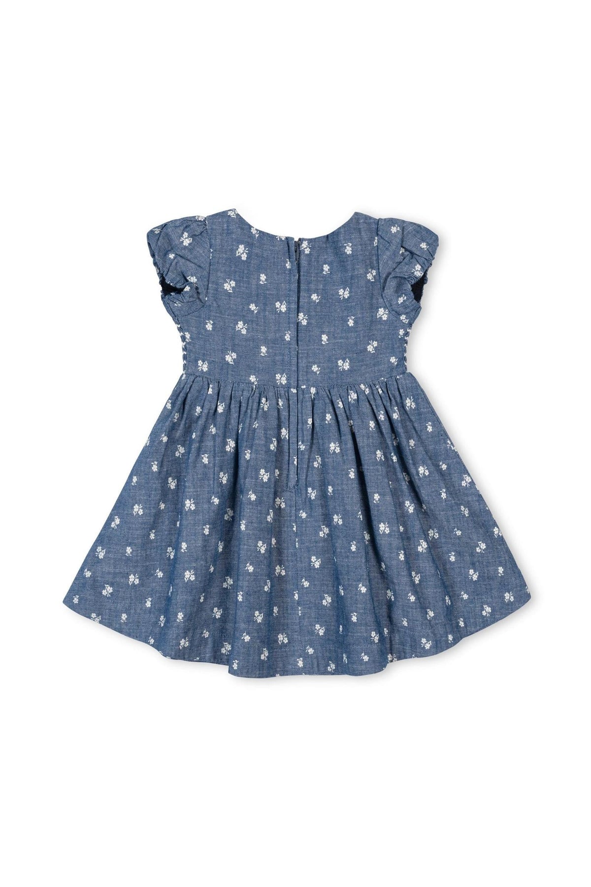 Back view of a soft blue chambray baby dress with smocked puff sleeves and delicate white floral embroidery, made from 100% organic cotton for comfort and sustainability.