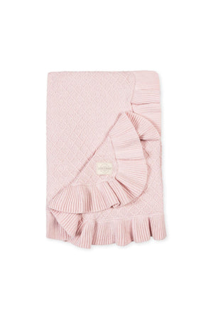 A pale pink organic cotton baby blanket features a delicate ruffle edge and textured stitch, offering a soft and cozy feel, perfect for everyday outings. Ideal for infants and toddlers.