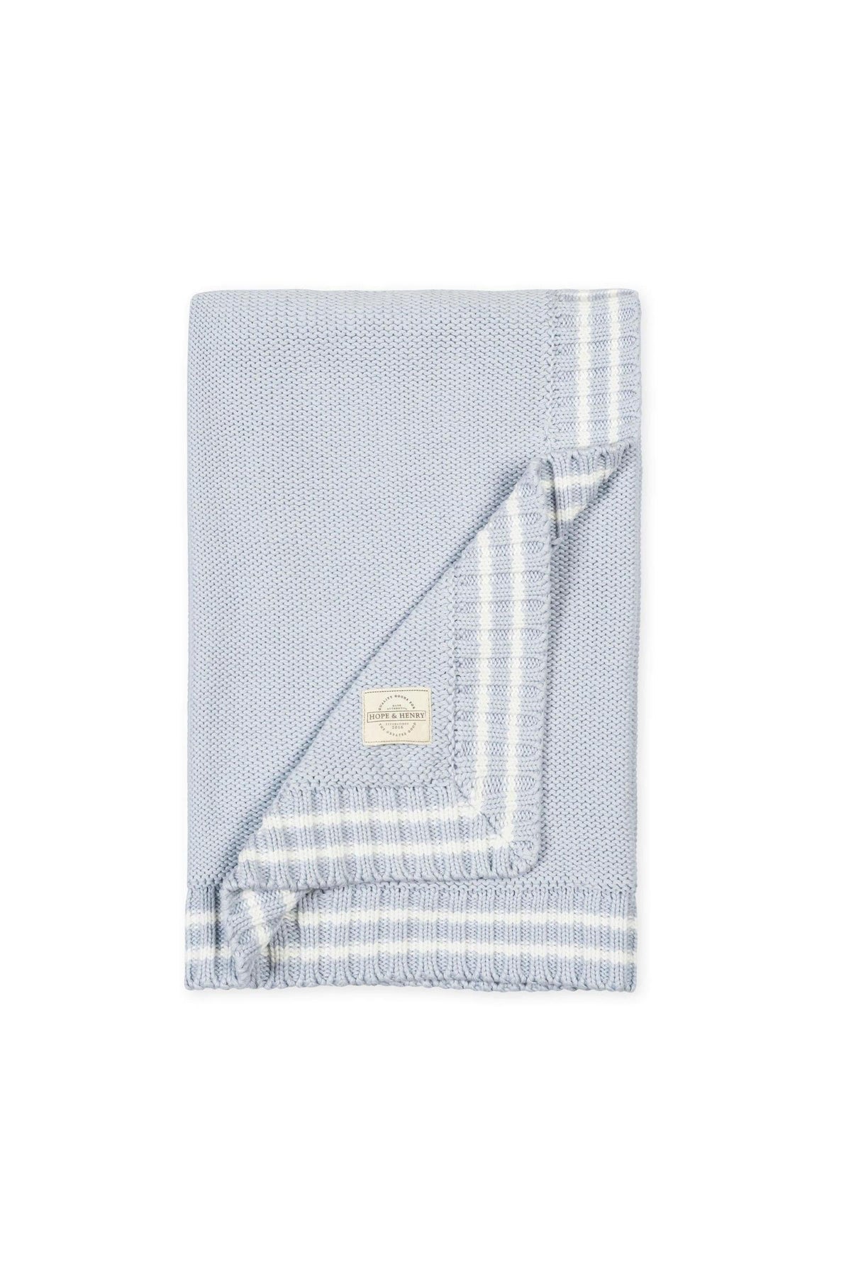 A pale blue organic cotton baby blanket features a classic cable knit texture and a stylish stripe trim. This soft, GOTS-certified blanket is perfect for infants comfort and warmth.