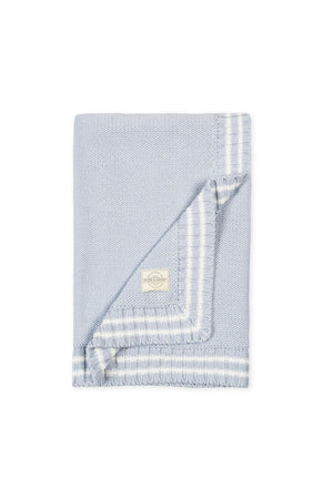 A pale blue organic cotton baby blanket features a classic cable knit texture and a stylish stripe trim. This soft, GOTS-certified blanket is perfect for infants comfort and warmth.