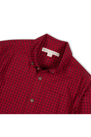 Red gingham long sleeve shirt by Hope & Henry, made from soft organic cotton stretch poplin. Features a button-down collar and a functional chest pocket, perfect for kids ages 2T-18.