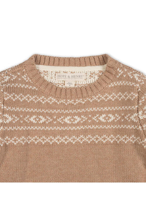 Close-up of a camel-colored organic cotton sweater featuring a Fair Isle design in cream. The crew neck pullover is made by Hope & Henry, highlighting its eco-friendly attributes.