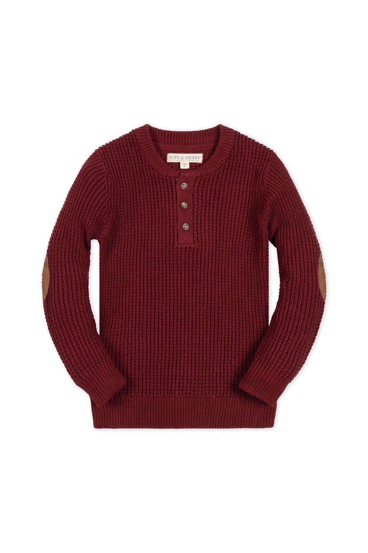 A cozy oxblood waffle sweater henley with faux suede elbow patches, featuring a button closure and ribbed cuffs. Made from soft organic cotton, perfect for ages 2T-18.