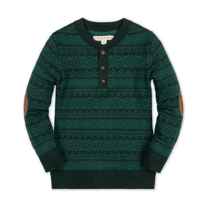 Deep green organic cotton sweater henley featuring a geometric pattern, faux suede elbow patches, and a button closure. Ideal for children, combining comfort and style in a sustainable design.