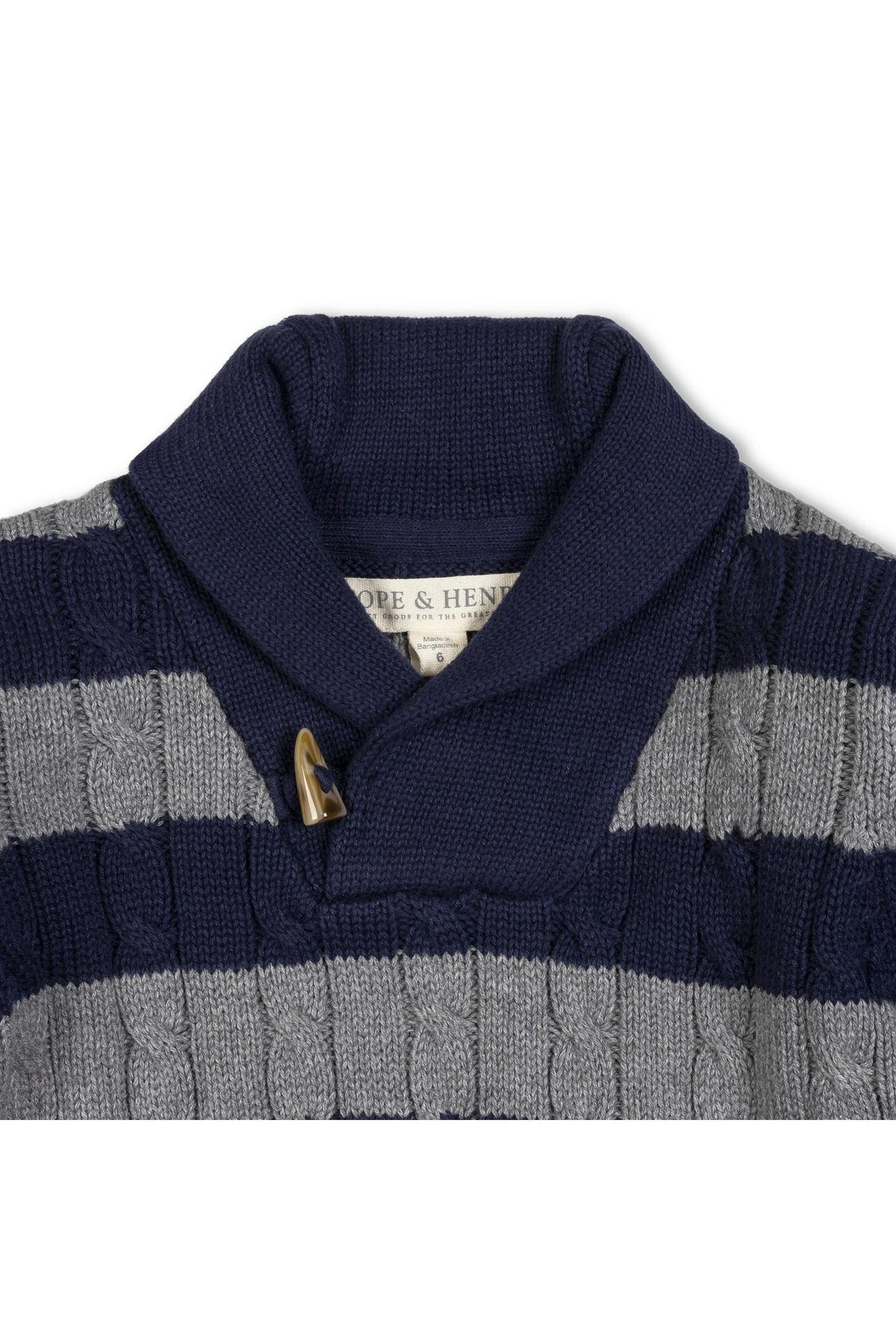 A cozy shawl collar sweater in navy and gray stripes, made from soft organic cotton, featuring a faux horn toggle closure. Perfect for stylish comfort in sizes 2T-18.