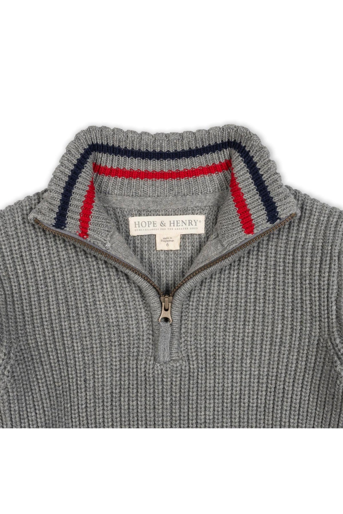 A dark gray organic cotton half-zip sweater by Hope & Henry features a ribbed texture and a striped collar in red and navy, ideal for layering on cooler days.