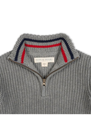 A dark gray organic cotton half-zip sweater by Hope & Henry features a ribbed texture and a striped collar in red and navy, ideal for layering on cooler days.