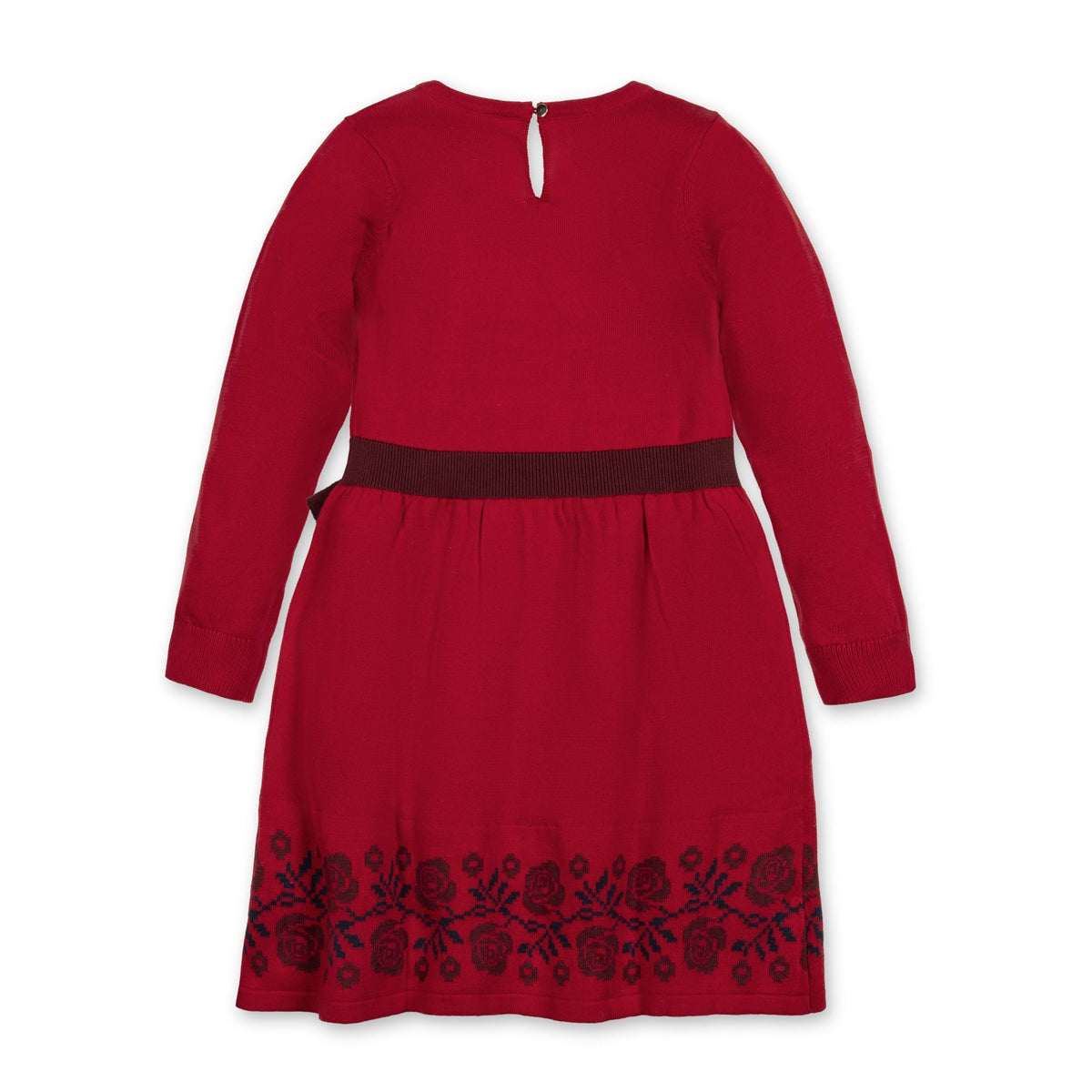A back view of a red organic cotton skater sweater dress featuring long sleeves, a decorative bow at the waist, and floral embroidery along the hem.