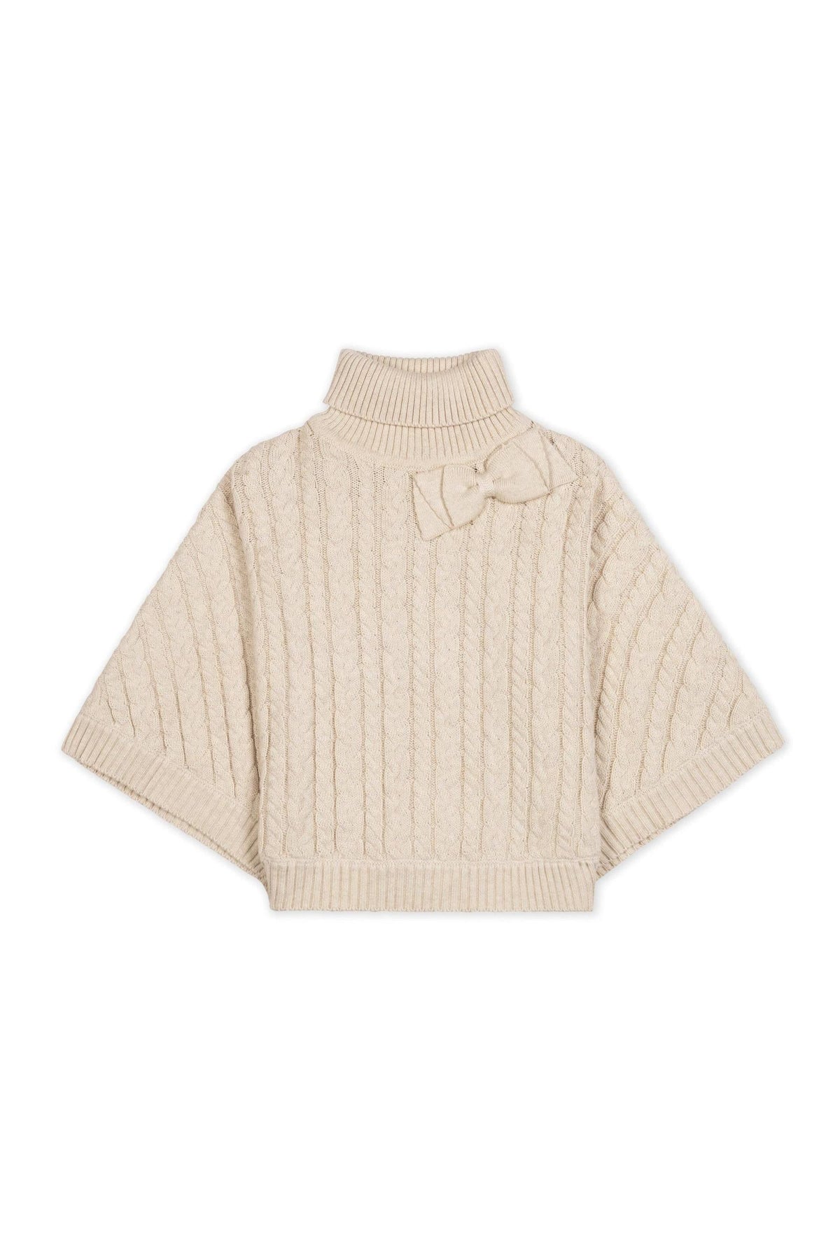 Light oatmeal organic cotton turtleneck cape featuring a cozy rib knit design and a bow detail at the neck. This sustainable garment is perfect for toddlers and girls.