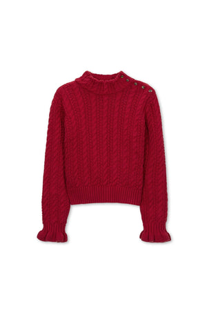 A vibrant red organic cotton turtleneck sweater featuring a textured cable knit design and ruffle cuffs.