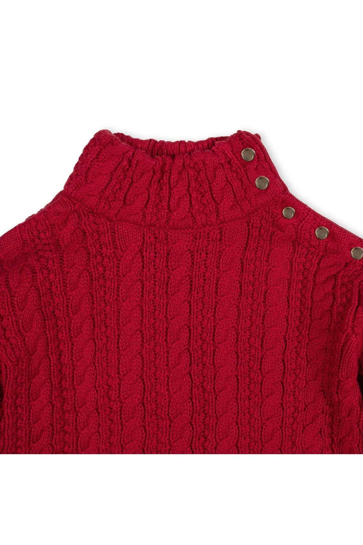 A vibrant red organic cotton turtleneck sweater features a textured cable knit design and stylish ruffle cuffs, complete with a gold button closure at the shoulder for easy dressing.