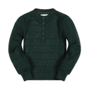 Deep green organic cotton henley sweater featuring puff sleeves and a scallop detail at the placket. The allover textured stitch adds a cozy touch, perfect for toddlers and kids.