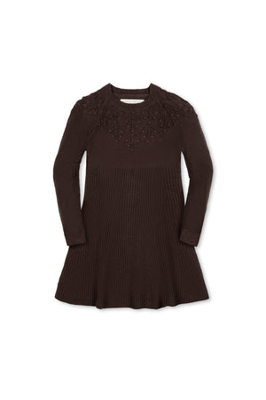 A chocolate heather sweater dress features a decorative stitch design around the shoulders, a ribbed texture, and a flared skirt, suitable for toddlers and girls. Made from 100% organic materials.