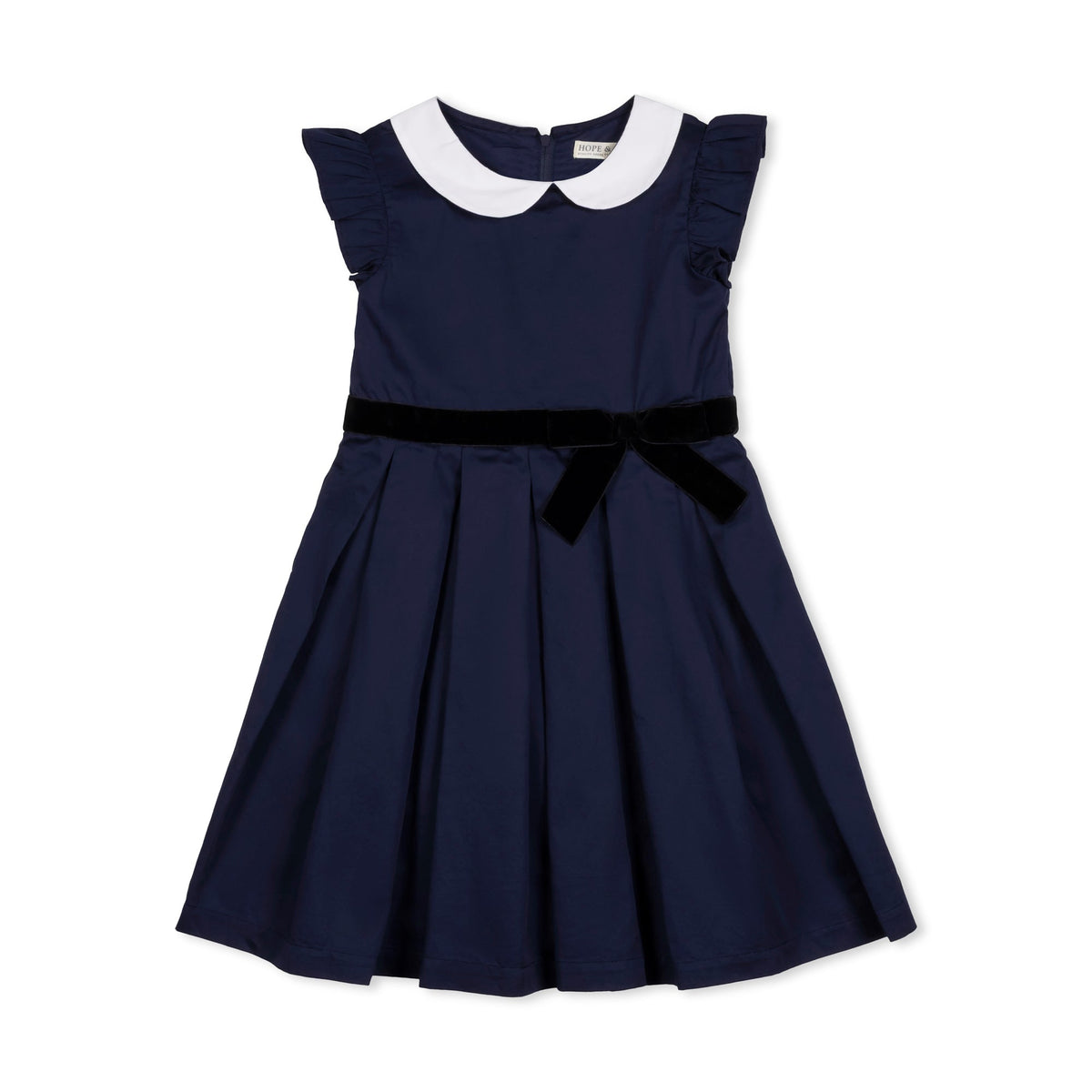A navy blue toddler dress features a woven white Peter Pan collar, flutter sleeves, and a black waist sash with a bow.