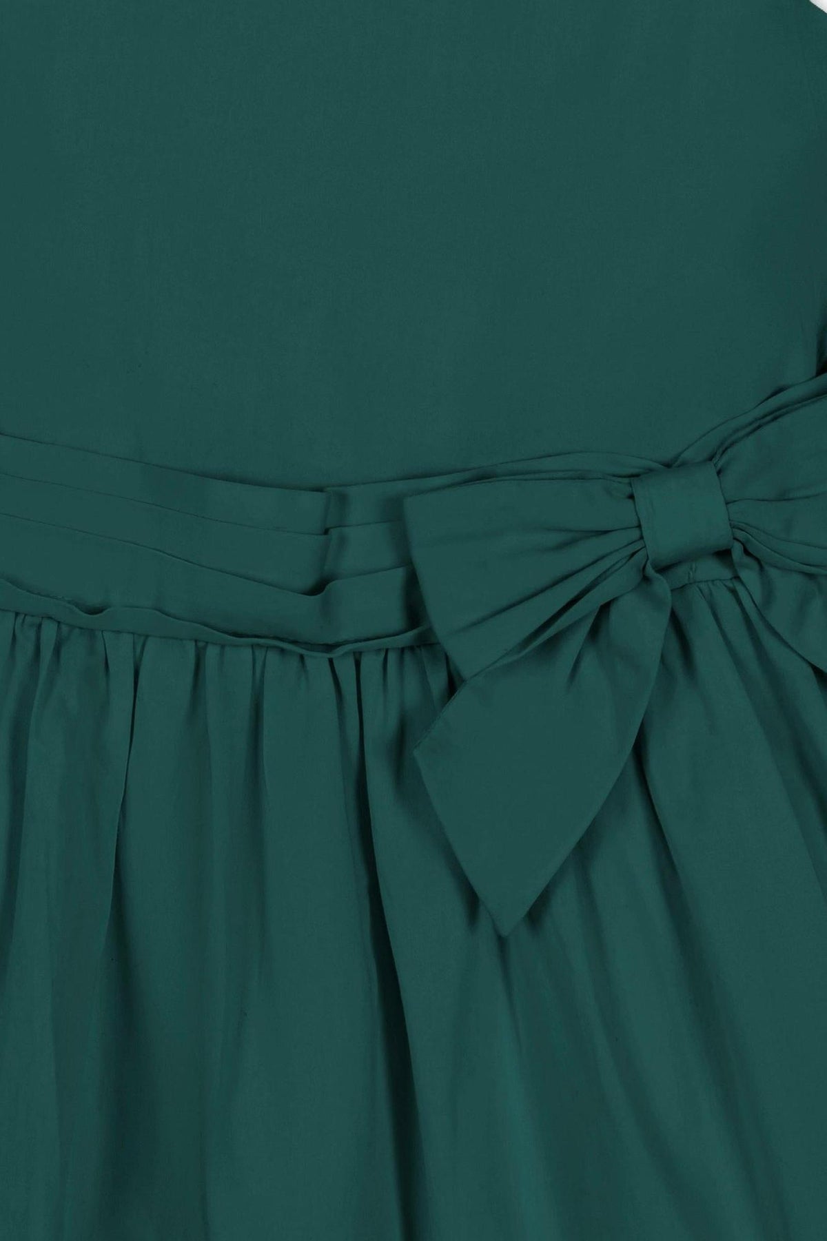 Deep green organic cotton sateen party dress featuring a tiered skirt and a waist sash with a bow. Ideal for toddlers and girls, this dress combines style with sustainability.